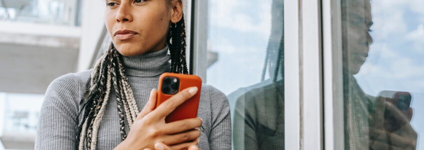 Unhappy woman on phone - photo by Alex Green