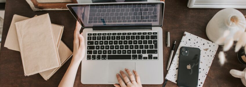 Woman working on laptop from home - Photo by Vlada Karpovich