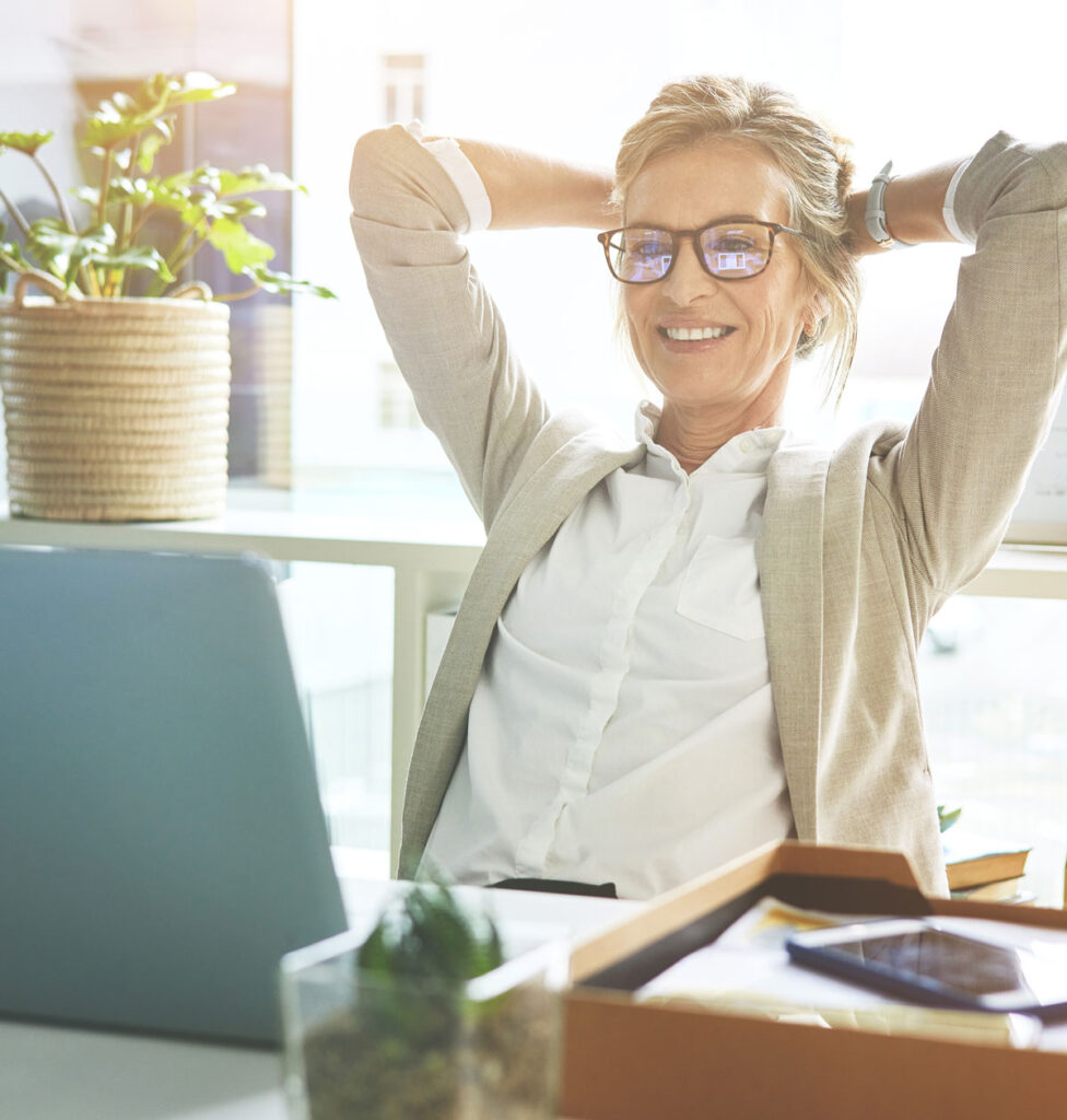HOA Board member smiling and relieved of stress after hiring Association One for HOA Management