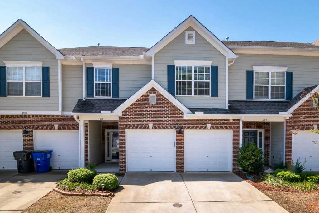 Seasonal garage door cleaning and maintenance to remove salt and debris