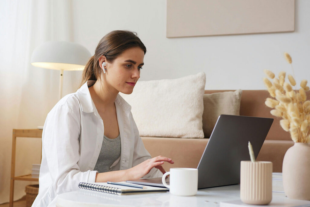 HOA residence reviewing compliance information on Association One's management platform